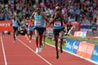 Mo Farah (GB) starts to celebrate after outsprinting Yenew Alamirew (Eith) in the 5000 metres at the IAAF Diamond League, Birmingham.